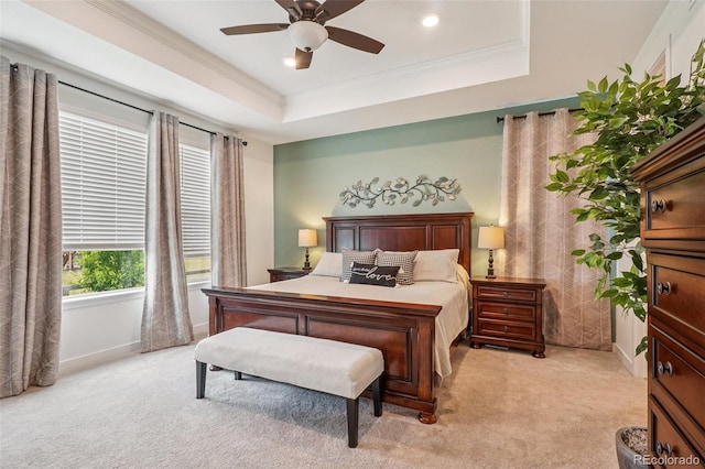 12841 Lake Port St, Longmont, CO 80504 - bedroom with light carpet, a tray ceiling, ornamental molding, recessed lighting, and ceiling fan