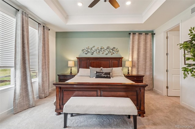 12841 Lake Port St, Longmont, CO 80504 - bedroom featuring a raised ceiling, light carpet, multiple windows, crown molding, and recessed lighting
