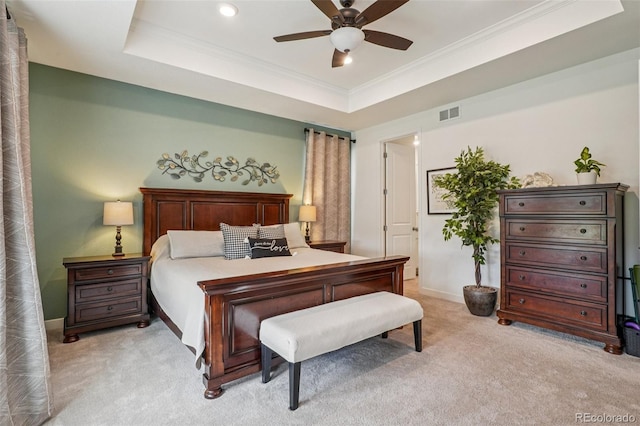 12841 Lake Port St, Longmont, CO 80504 - bedroom featuring light carpet, a tray ceiling, ornamental molding, recessed lighting, and ceiling fan