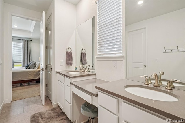 12841 Lake Port St, Longmont, CO 80504 - full bath featuring double vanity, ensuite bathroom, and recessed lighting