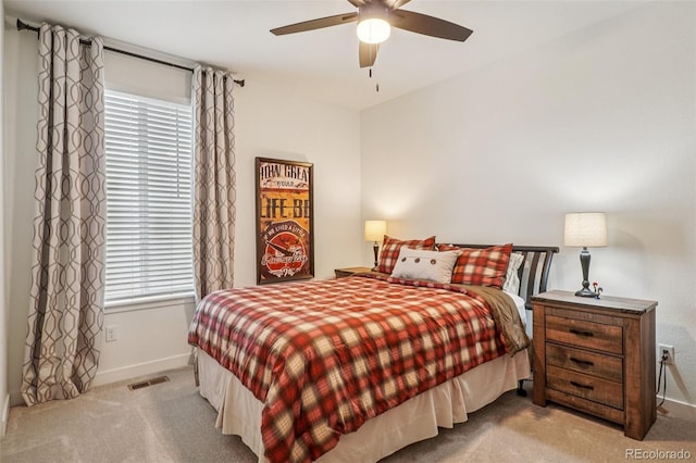 12841 Lake Port St, Longmont, CO 80504 - carpeted bedroom with multiple windows and ceiling fan