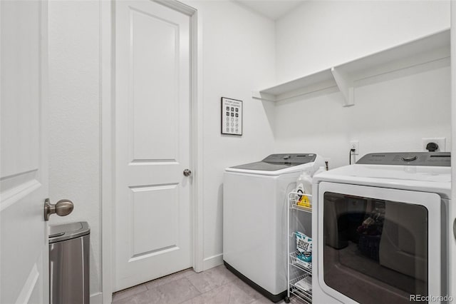12841 Lake Port St, Longmont, CO 80504 - laundry area with washing machine and clothes dryer