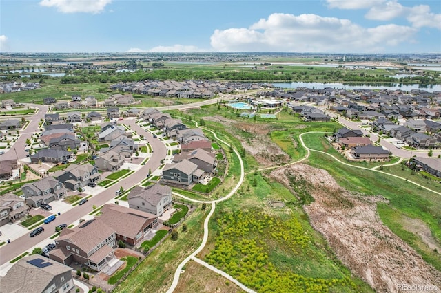 12841 Lake Port St, Longmont, CO 80504 - aerial overview of property's location with a nearby body of water and nearby suburban area