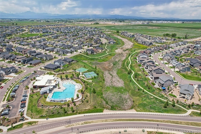 12841 Lake Port St, Longmont, CO 80504 - aerial view of property's location with a pool and nearby suburban area