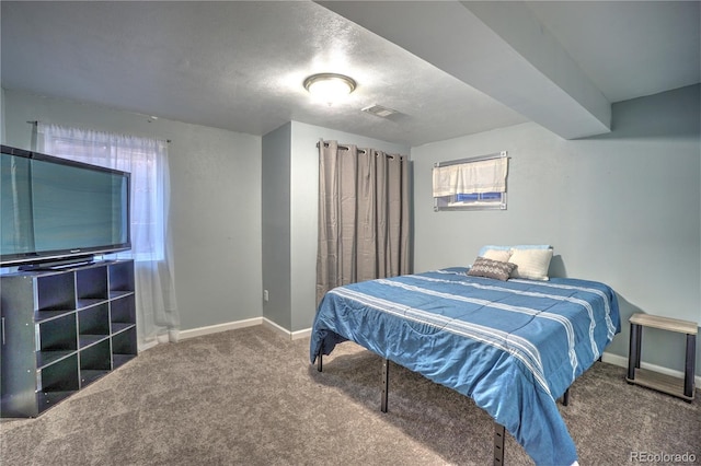 bedroom featuring carpet flooring, baseboards, and visible vents