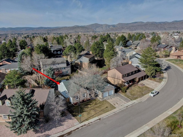 bird's eye view featuring a mountain view and a residential view