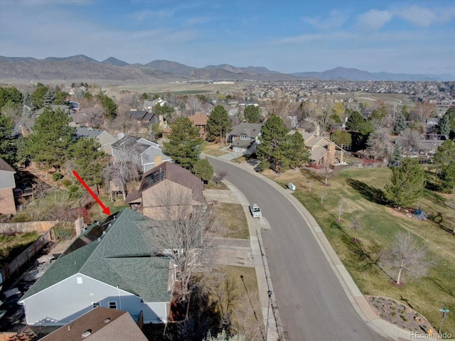drone / aerial view with a mountain view and a residential view