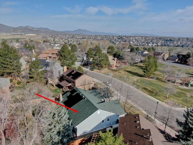 aerial view featuring a mountain view and a residential view