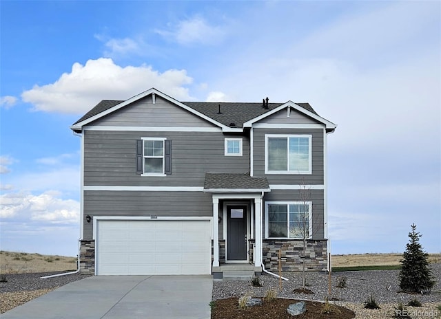 view of front of property featuring a garage