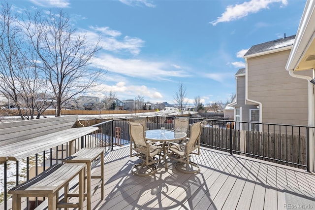 view of snow covered deck