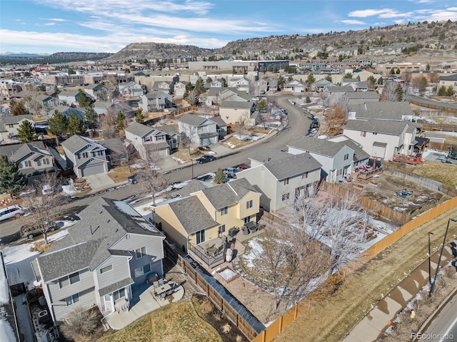 birds eye view of property featuring a mountain view