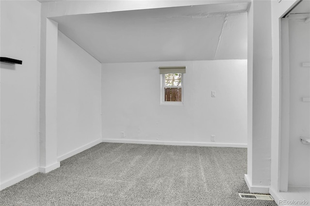 basement with carpet floors and baseboards