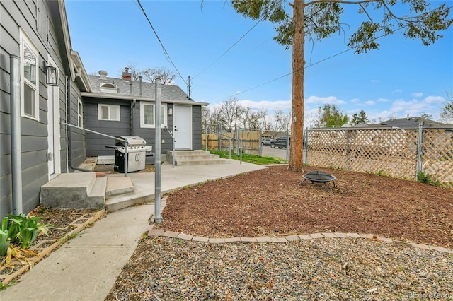 view of yard with a patio and fence