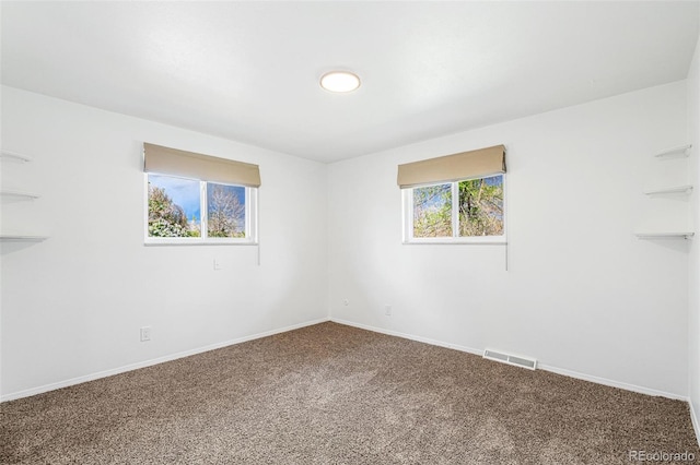 1772 S Pierce St, Lakewood, CO 80232 - carpeted spare room with baseboards and visible vents