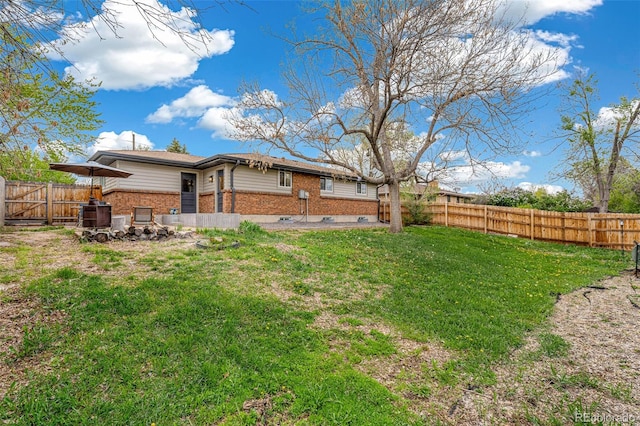 1772 S Pierce St, Lakewood, CO 80232 - view of yard featuring a fenced backyard