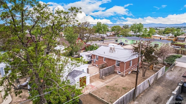 8110 Ivy St, Dupont, CO 80024 - aerial perspective of suburban area with a mountainous background