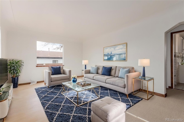 8110 Ivy St, Commerce City, CO 80022 - living room featuring baseboards and wood finished floors