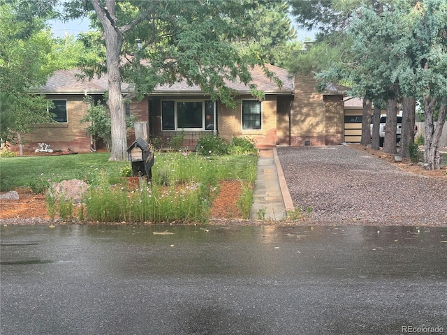 view of front of property with a water view