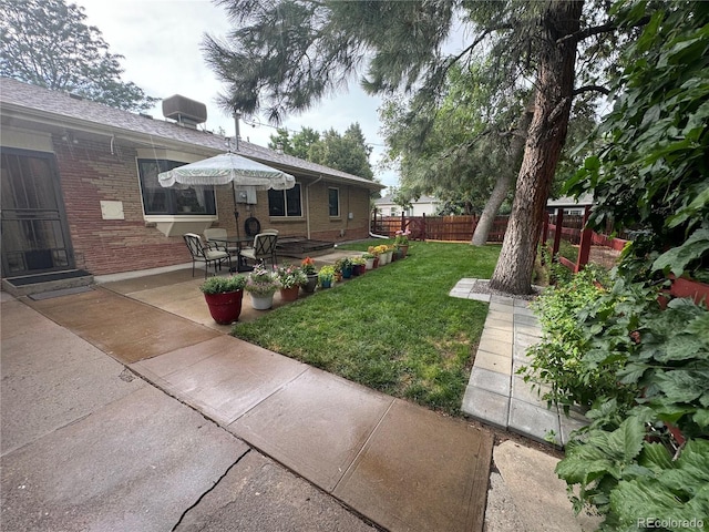 view of yard with a patio area