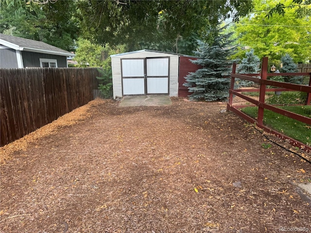 exterior space with a shed