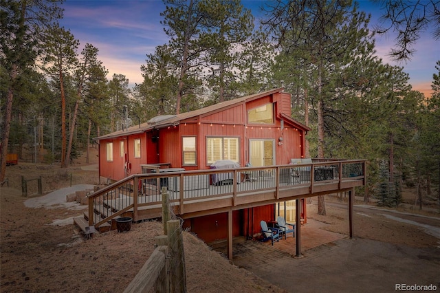 view of front of property featuring a patio area and a deck