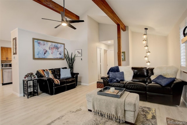 living room featuring baseboards, light wood-style flooring, ceiling fan, beamed ceiling, and high vaulted ceiling