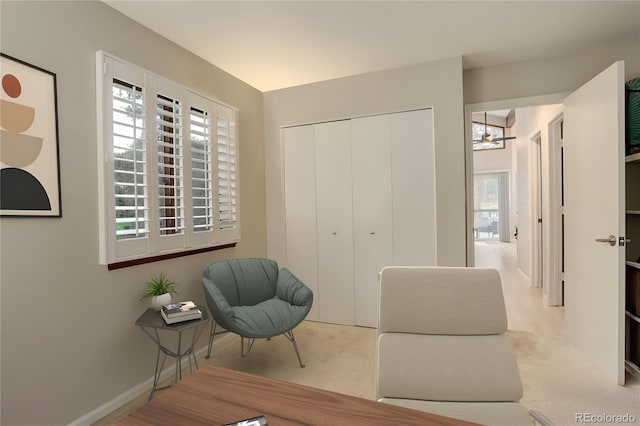 sitting room featuring baseboards