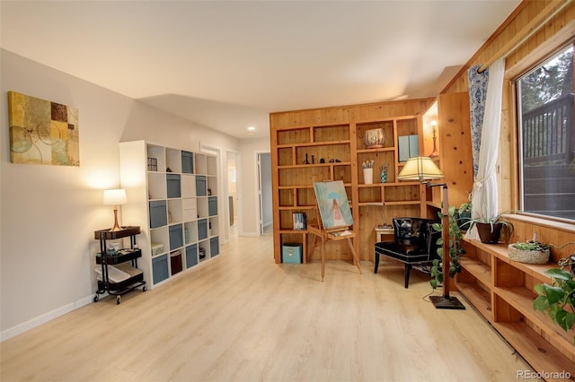 sitting room featuring wood finished floors and baseboards