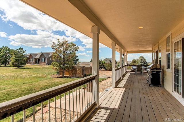 895 Antelope Dr W, Bennett, CO 80102 - wooden porch featuring a yard, area for grilling, and a residential view