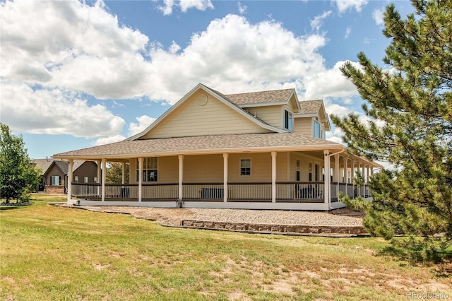 895 Antelope Dr W, Bennett, CO 80102 - rear view of house featuring roof with shingles, a yard, and covered porch
