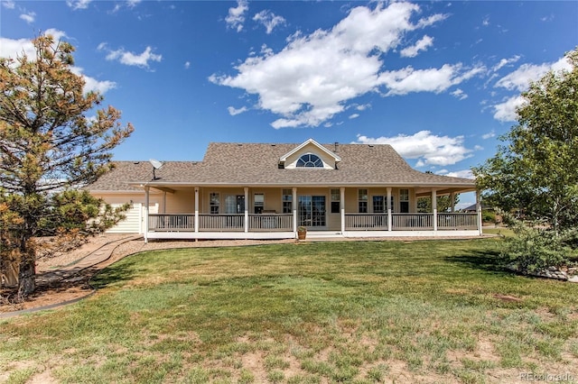 895 Antelope Dr W, Bennett, CO 80102 - back of property featuring a yard, a porch, and a shingled roof