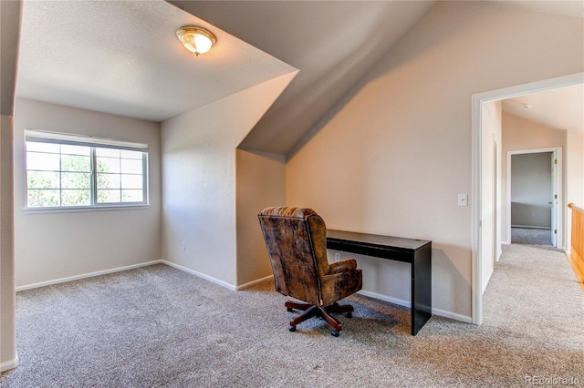 895 Antelope Dr W, Bennett, CO 80102 - office featuring carpet floors, lofted ceiling, and baseboards
