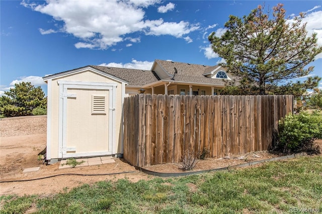 895 Antelope Dr W, Bennett, CO 80102 - view of home's exterior featuring roof with shingles