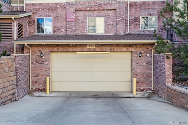 garage featuring driveway