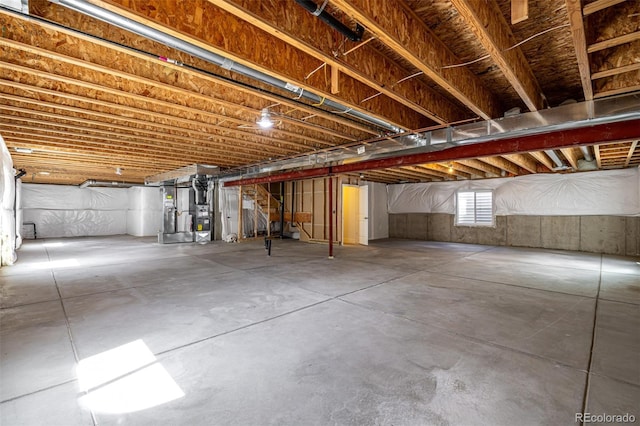 basement featuring heating unit
