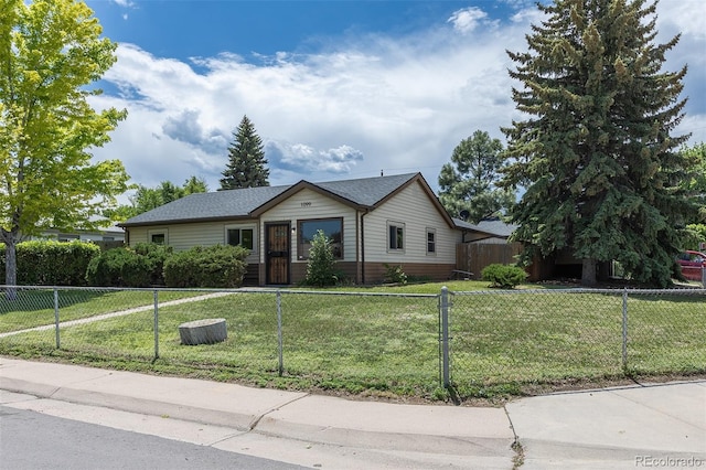 1099 Wheeling St, Aurora, CO 80011 - single story home with a fenced front yard