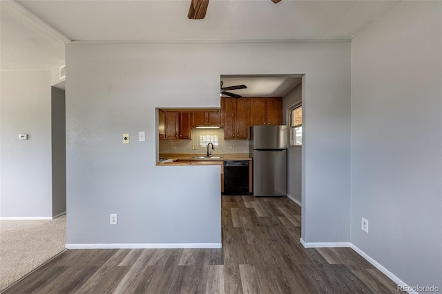 1099 Wheeling St, Aurora, CO 80011 - kitchen with freestanding refrigerator, a ceiling fan, dishwasher, and dark wood-type flooring