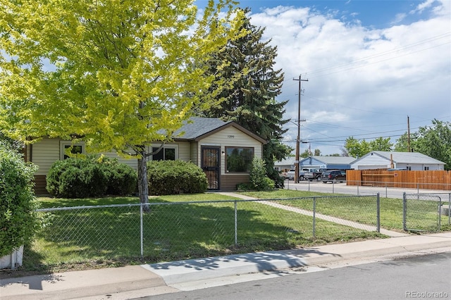 1099 Wheeling St, Aurora, CO 80011 - view of front of property featuring a fenced front yard