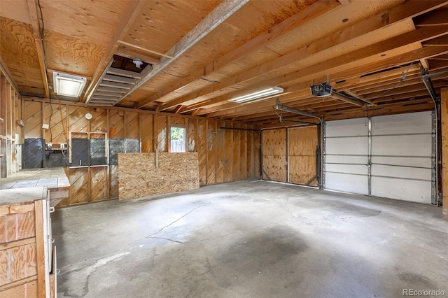 1099 Wheeling St, Aurora, CO 80011 - garage featuring a garage door opener