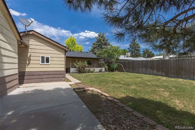 1099 Wheeling St, Aurora, CO 80011 - view of yard featuring a patio