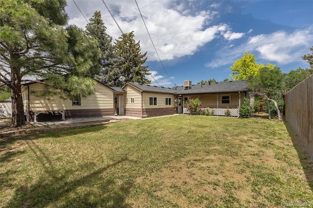 1099 Wheeling St, Aurora, CO 80011 - back of property with a patio