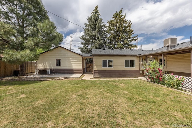 1099 Wheeling St, Aurora, CO 80011 - rear view of house featuring a patio area