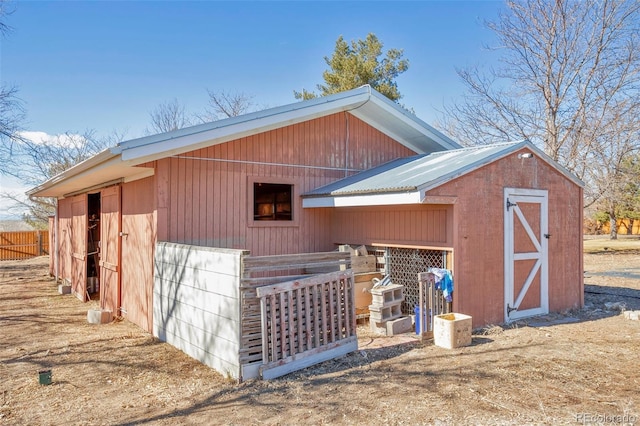 view of outbuilding featuring an exterior structure and an outbuilding