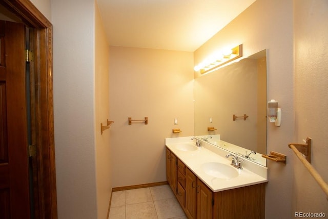 bathroom with vanity and tile patterned flooring