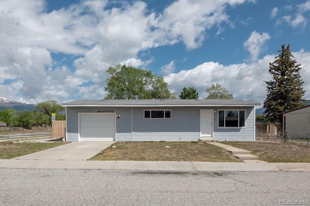 101 Harvard Ln, Buena Vista, CO 81211 - single story home with a garage and concrete driveway