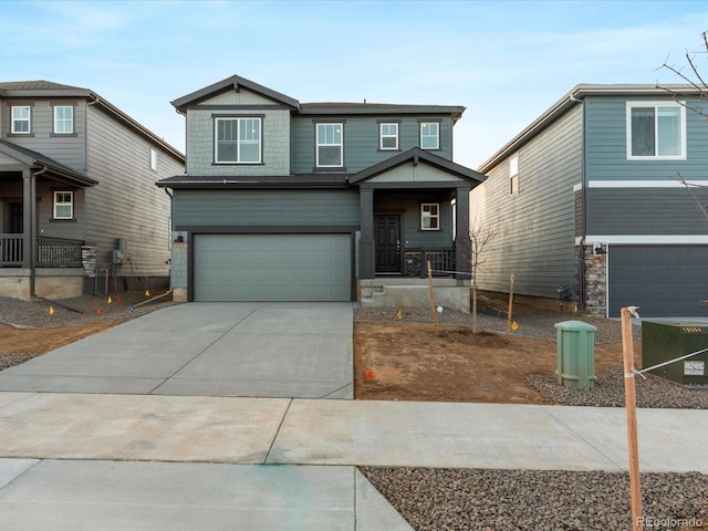 view of front of home featuring central AC, covered porch, and a garage