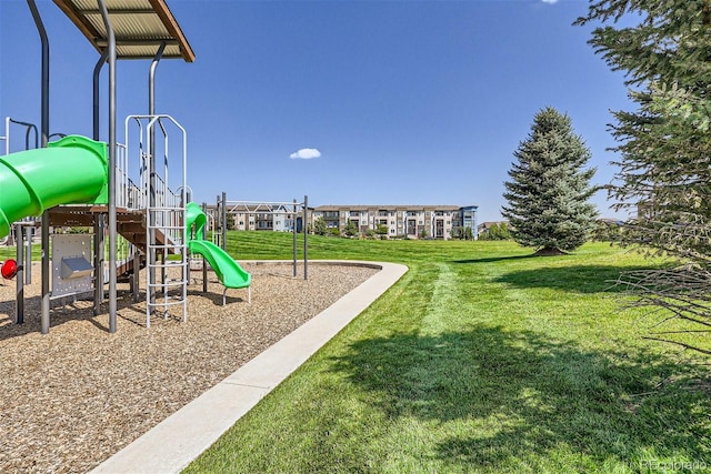 view of playground with a yard