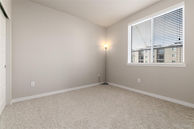 view of carpeted spare room