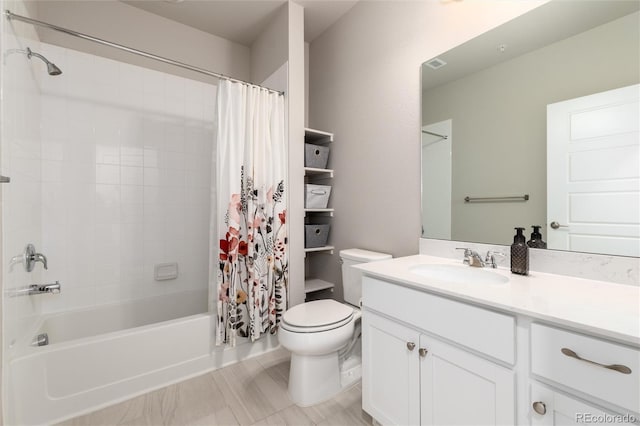 full bathroom featuring shower / bath combo, toilet, and vanity