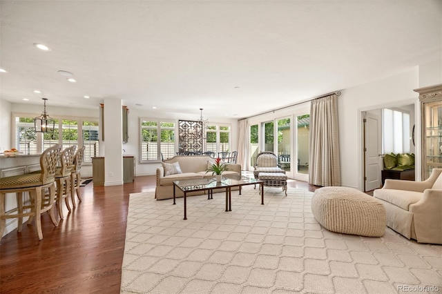 344 Saint Paul St, Denver, CO 80206 - living room with light wood-style flooring, a chandelier, and recessed lighting